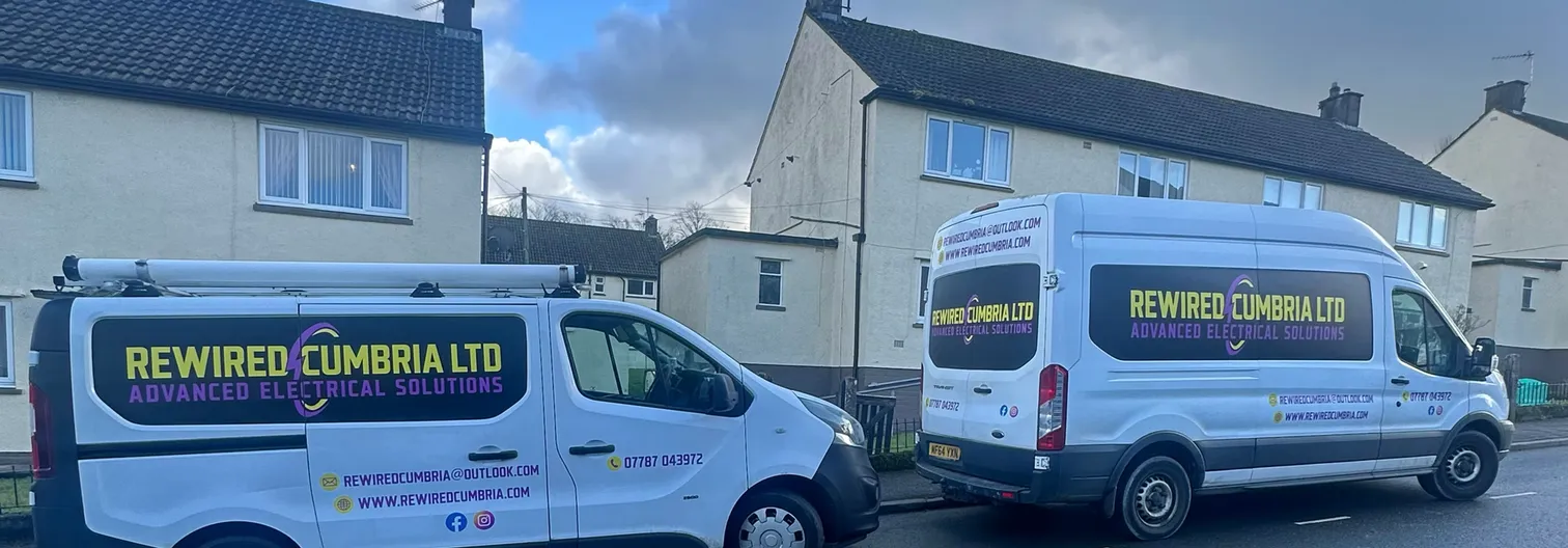 Rewired Cumbria Electricians Vans on site in Workington